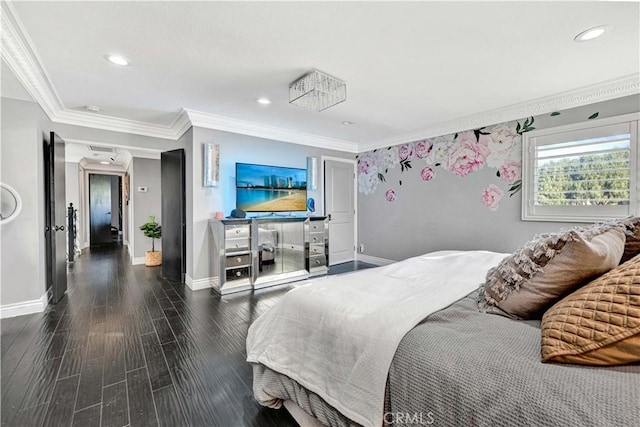 bedroom with crown molding and dark hardwood / wood-style flooring