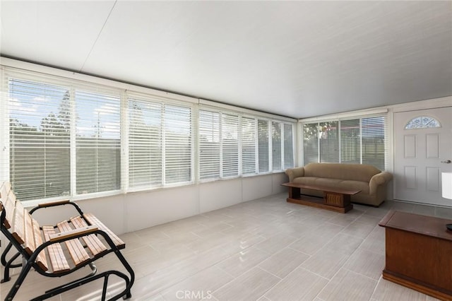 sunroom with plenty of natural light