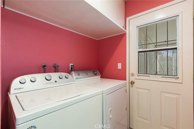 laundry room featuring washing machine and dryer