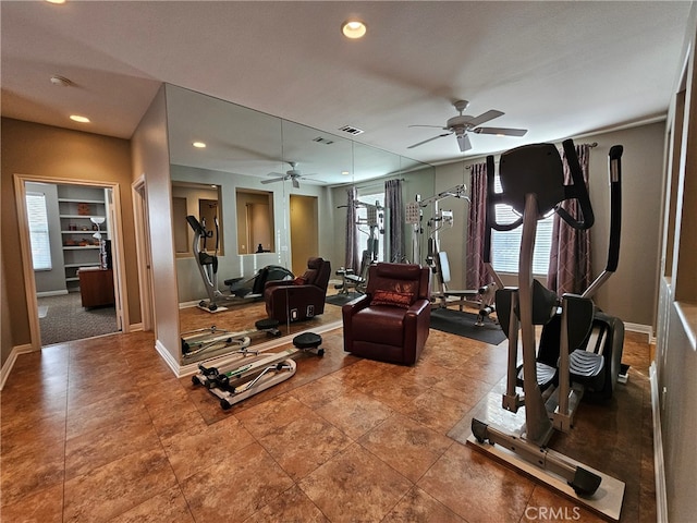 exercise area with a ceiling fan, recessed lighting, visible vents, and baseboards