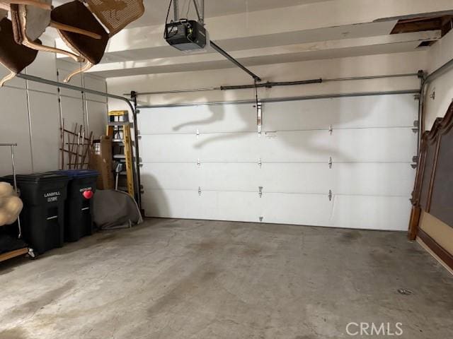 garage featuring a garage door opener