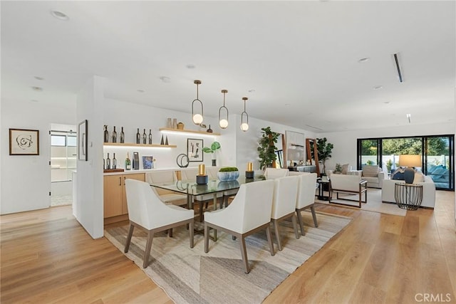 dining area featuring light hardwood / wood-style flooring