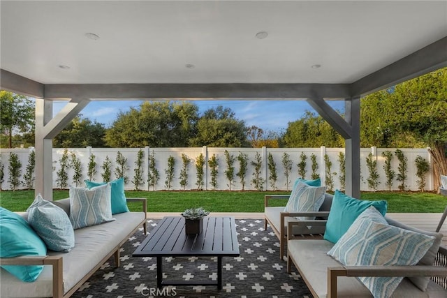 view of patio with outdoor lounge area and a fenced backyard