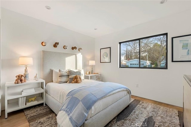 bedroom featuring wood-type flooring