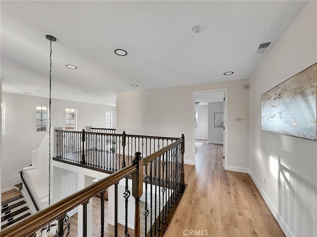 hallway featuring light hardwood / wood-style flooring