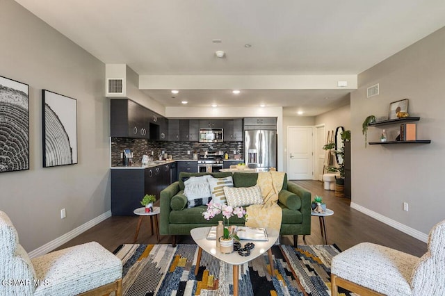 living room featuring dark wood-type flooring