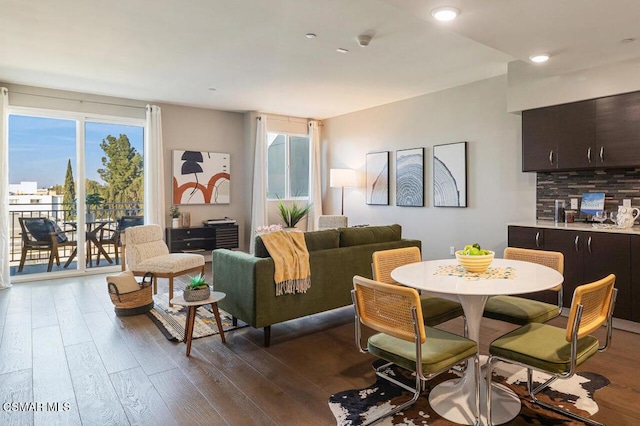 living room with dark hardwood / wood-style floors