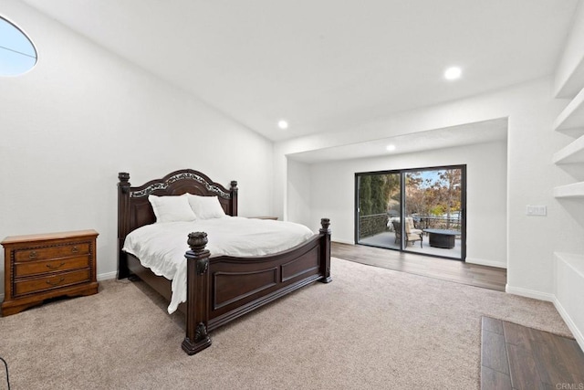 bedroom featuring carpet flooring and access to exterior