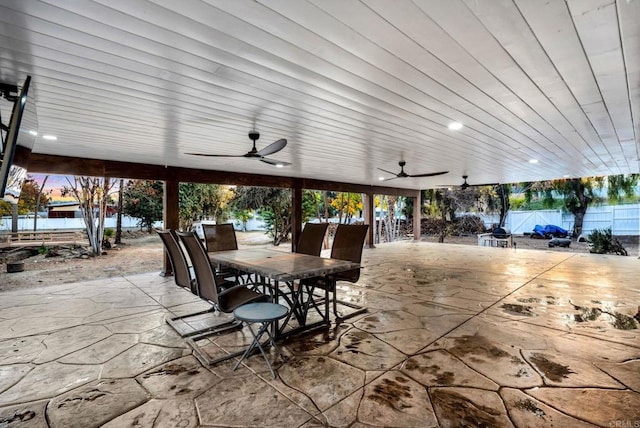 patio terrace at dusk with ceiling fan