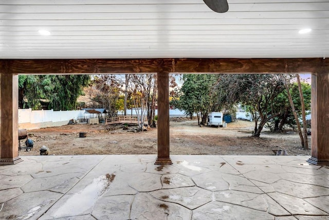 view of patio featuring ceiling fan