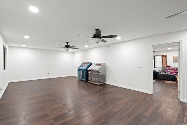 interior space with ceiling fan