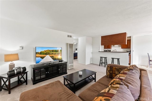 living room with light colored carpet