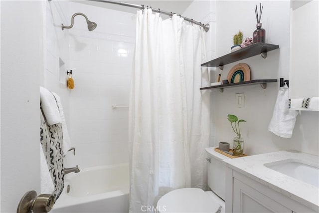 full bathroom with toilet, vanity, and shower / tub combo