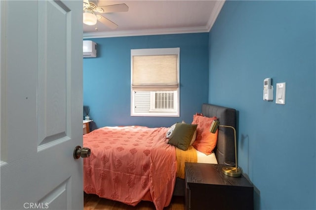 bedroom featuring ceiling fan, crown molding, and a wall unit AC