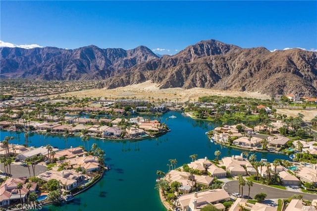 aerial view with a water and mountain view