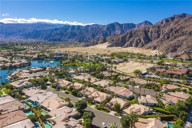 aerial view with a water and mountain view