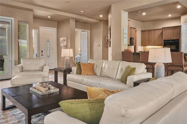 living room with light tile patterned floors