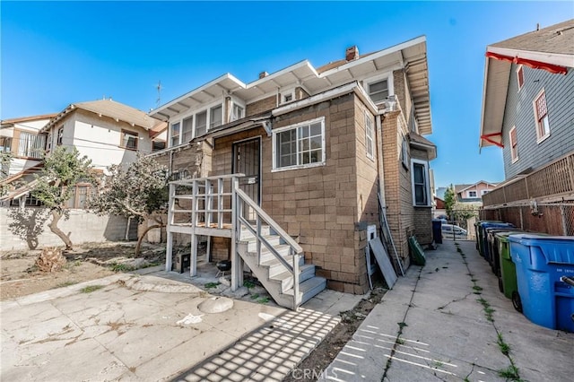 view of front of property featuring a patio