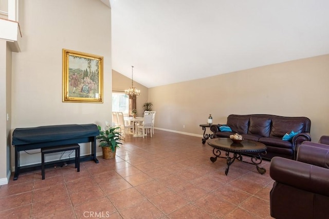 tiled living room featuring a chandelier and high vaulted ceiling