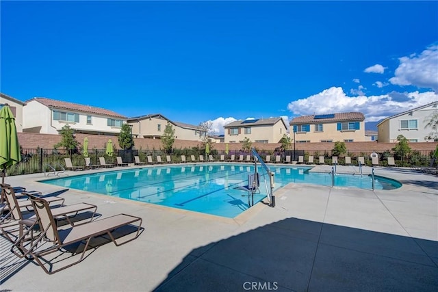 view of swimming pool featuring a patio area