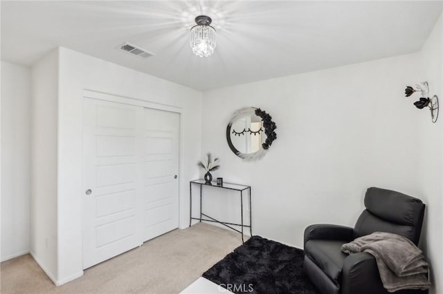 carpeted bedroom with a closet