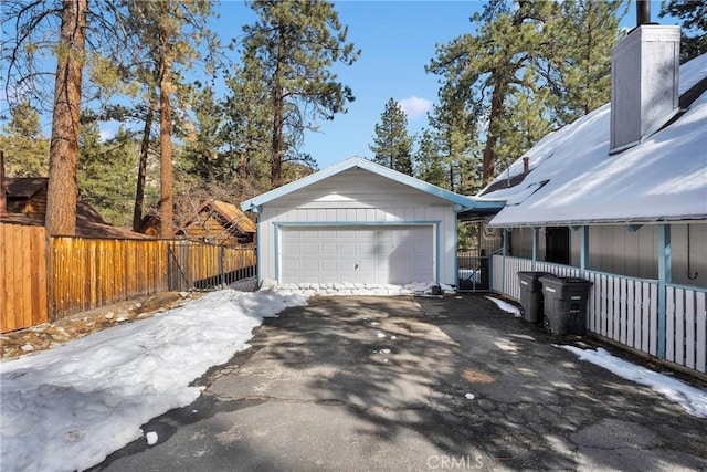 view of snow covered garage