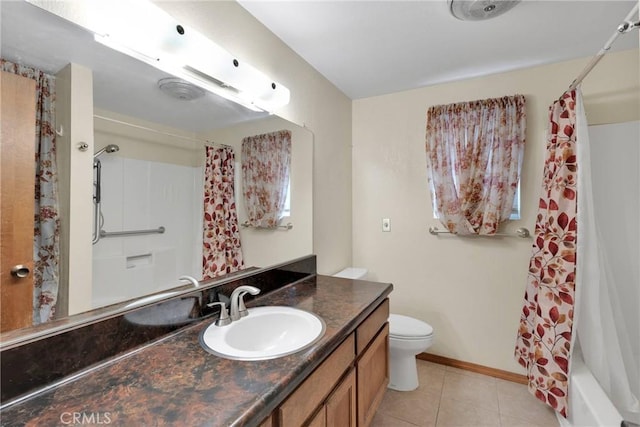 full bathroom featuring tile patterned floors, vanity, toilet, and shower / bath combo