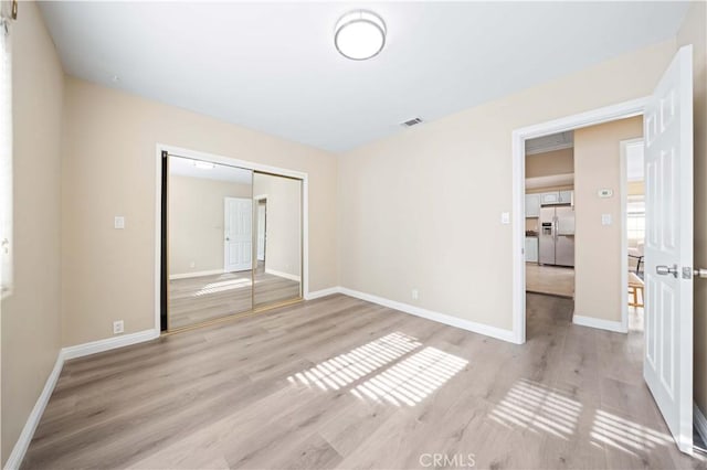 empty room featuring light wood-type flooring