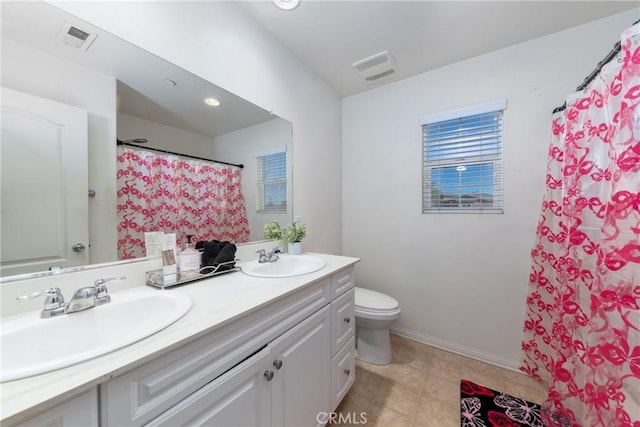 bathroom featuring a shower with curtain, toilet, tile patterned floors, and vanity