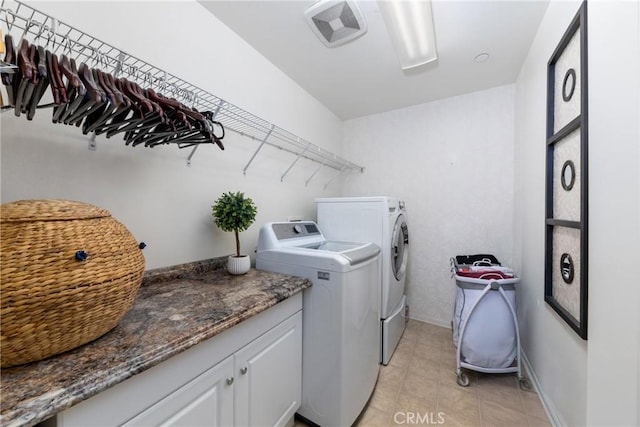 laundry area with cabinets and washer and dryer