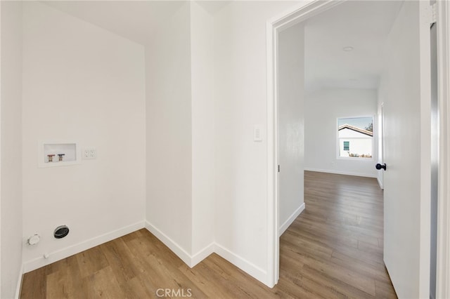 laundry room with hookup for a gas dryer, wood-type flooring, and hookup for a washing machine