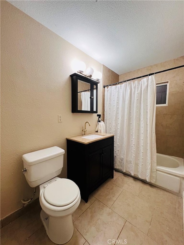 full bathroom with vanity, toilet, shower / bath combination with curtain, and a textured ceiling