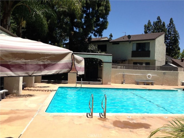 view of pool with a patio area