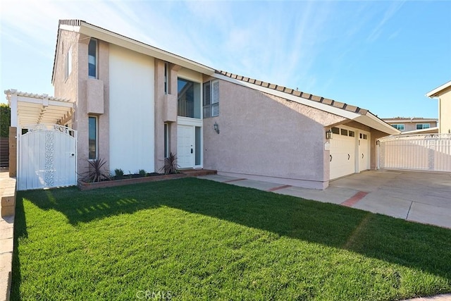 exterior space featuring a garage and a front yard