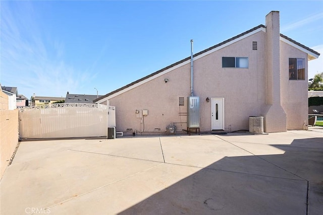 rear view of house featuring a patio