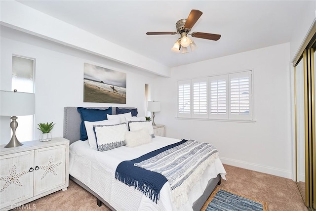 carpeted bedroom with ceiling fan