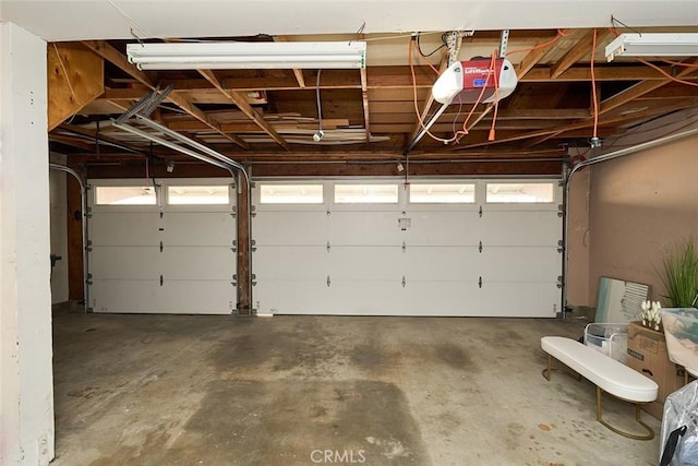 garage featuring a garage door opener