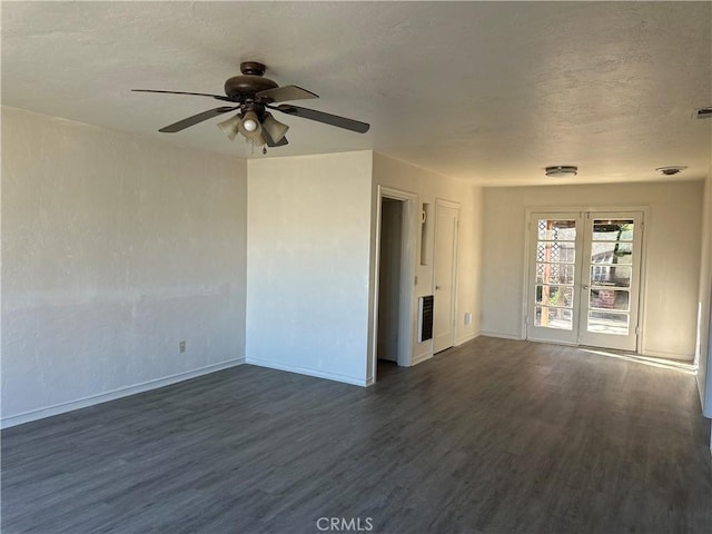 unfurnished room with ceiling fan and dark hardwood / wood-style flooring