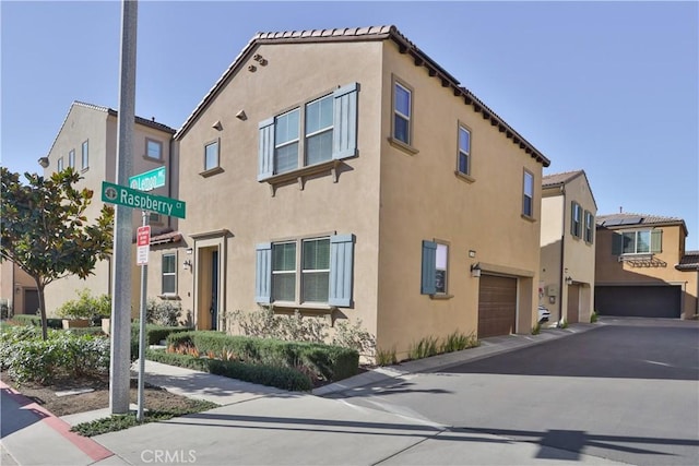 view of property featuring a garage