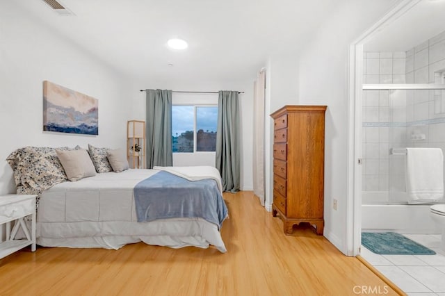 bedroom featuring wood-type flooring