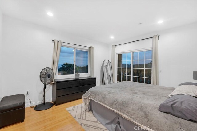 bedroom featuring hardwood / wood-style flooring