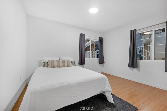 bedroom featuring hardwood / wood-style floors