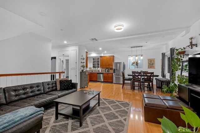 living room featuring light wood-type flooring