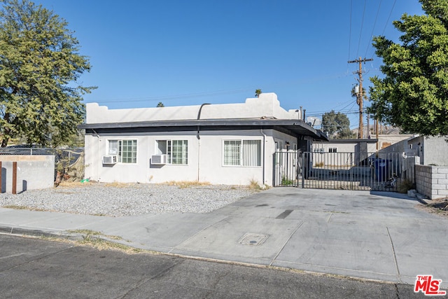 view of front of property featuring cooling unit