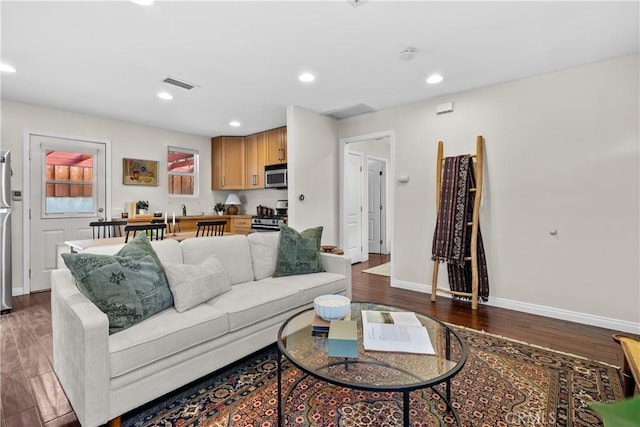 living room with hardwood / wood-style flooring