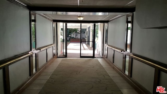 hallway with expansive windows