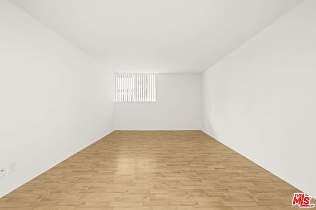 empty room with light wood-type flooring