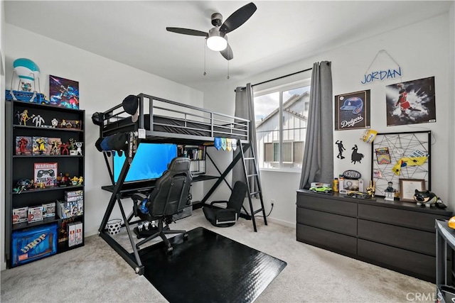 carpeted bedroom featuring ceiling fan