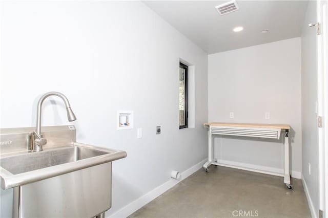 laundry area with sink, hookup for a washing machine, and hookup for an electric dryer