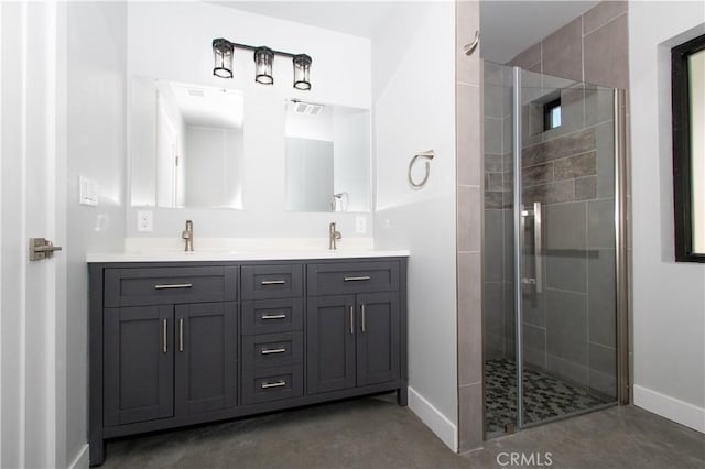 bathroom featuring concrete floors, an enclosed shower, and vanity